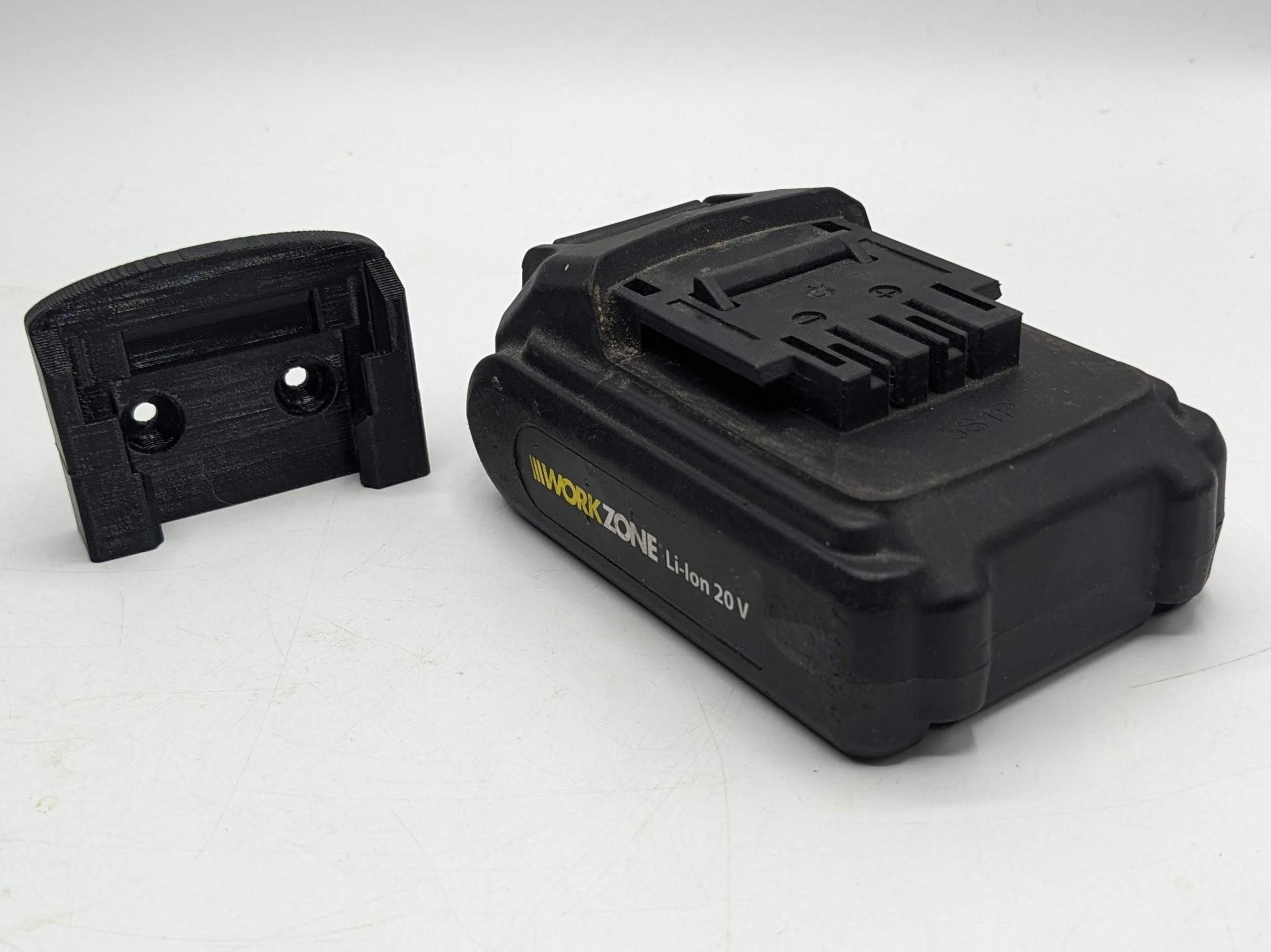 Workzone 20v Battery Wall / Undershelf Mount Holder for the Shed, Van or Workshop.  Price is for one battery holder.