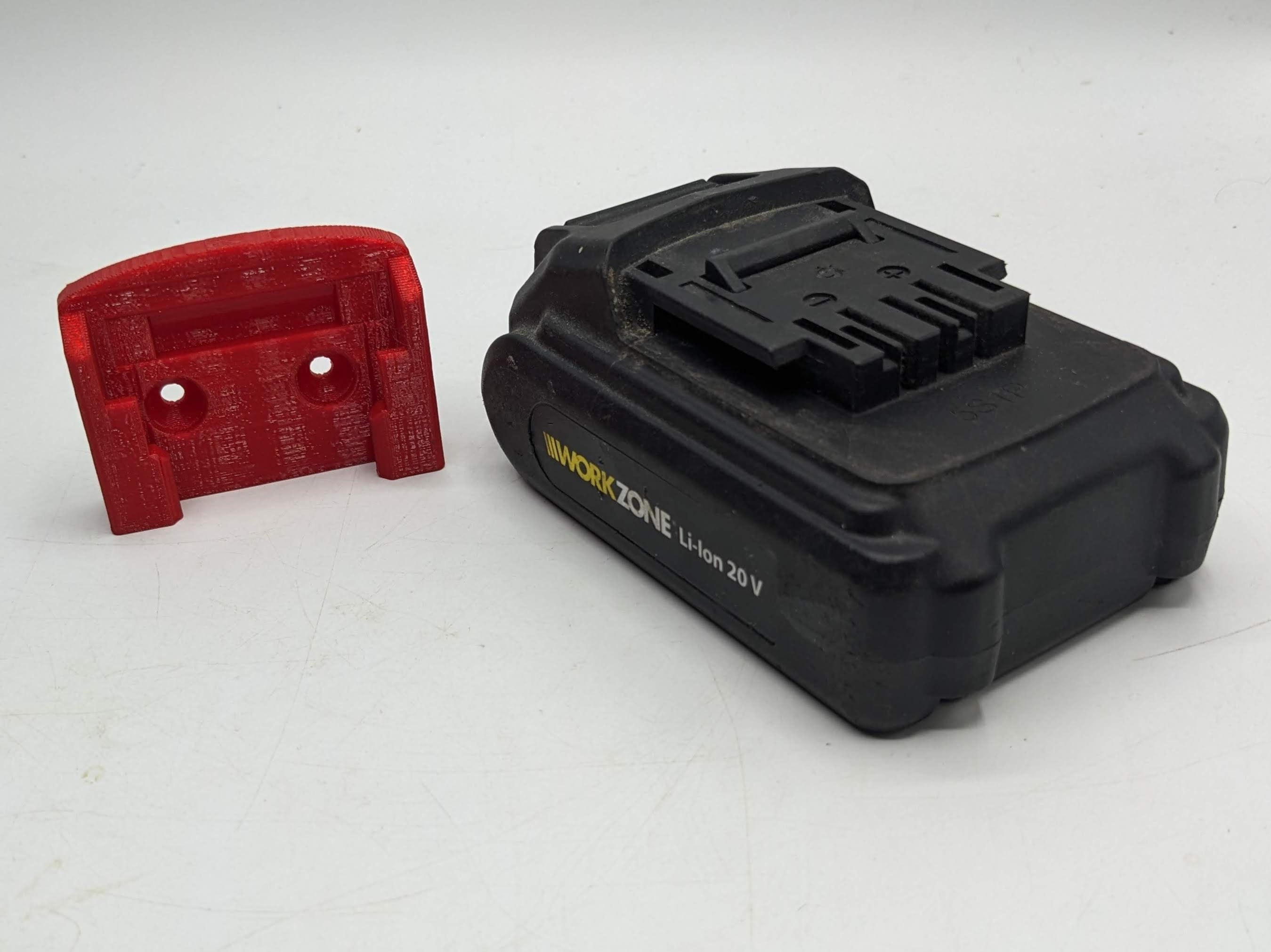 Workzone 20v Battery Wall / Undershelf Mount Holder for the Shed, Van or Workshop.  Price is for one battery holder.